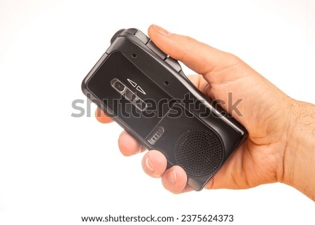 Audio recorder with microcassette. device for working with voice and journalism. analog audio recording. Royalty-Free Stock Photo #2375624373