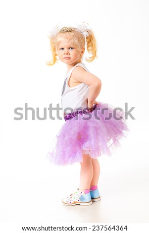 little girl  standing on white background