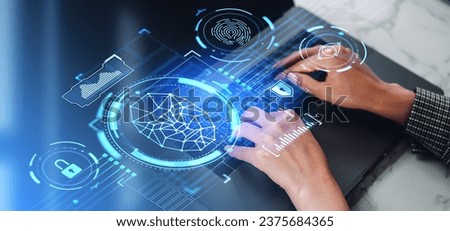 Top view of woman hands typing in computer, biometric verification and face id hologram hud. Digital hologram with fingerprint, padlock and eye tracking. Concept of data security and online protection Royalty-Free Stock Photo #2375684365