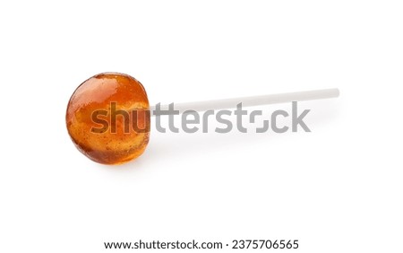One sweet orange lollipop isolated on white Royalty-Free Stock Photo #2375706565