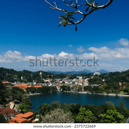 The image you sent shows the Kandy View Point in Kandy, Sri Lanka. It is a popular tourist destination that offers stunning views of the city and the surrounding mountains. The viewpoint is located on