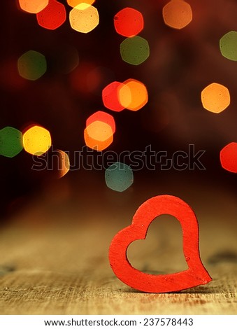 Heart on a wooden boards background.