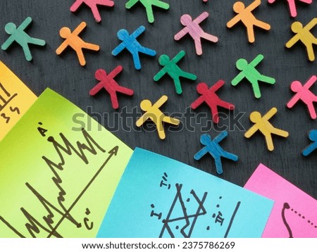 Charts and colorful figures. Research of demographic segmentation and target market. Royalty-Free Stock Photo #2375786269