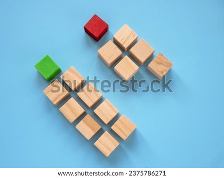 Two columns with red and green cube. Market segmentation and Target audience. Royalty-Free Stock Photo #2375786271