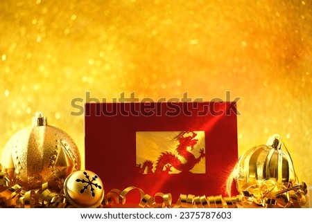 greeting card with asian dragon and festive christmas decorations close up on golden shiny abstract glittering background. Dragon - lunar new year 2024 symbol. template for design