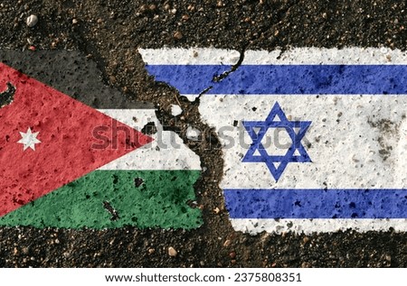 On the pavement are images of the flags of Israel and Jordan, as a symbol of confrontation. Conceptual image.