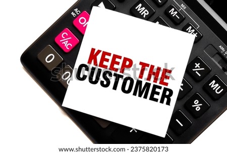 KEEP THE CUSTOMER on white sticker with calculator on white sticker with calculator