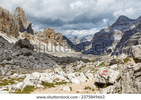 View from forcella Travenanzes, hiking trail number 401 Valley Val Travenanzes and rock face in Tofane gruppe, Alps Dolomites mountains, Fanes national park, Italy Royalty-Free Stock Photo #2375849663