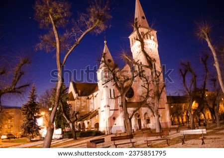 Night photo of a cathlolic church sepia