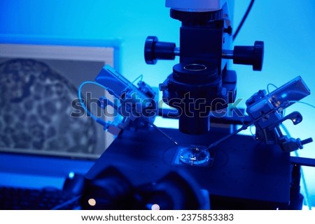 Lab setup being used during intracytoplasmic sperm injection procedure Royalty-Free Stock Photo #2375853383