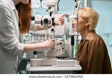 Ophthalmologist uses a diopter meter in his work