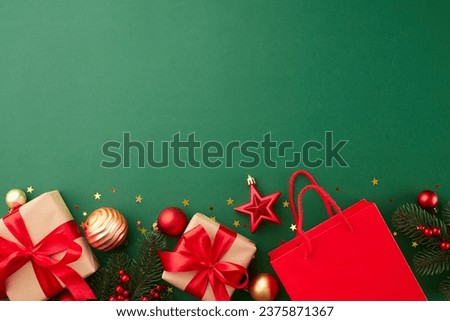 Fashionable Christmas gift themes. Top view shot of fir twigs, gift boxes, red package, сhristmas tree baubles, gold stars confetti on green background with promo spot