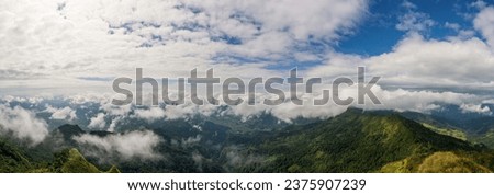 Green mountains view with blue sky background. Panorama picture countryside landscape