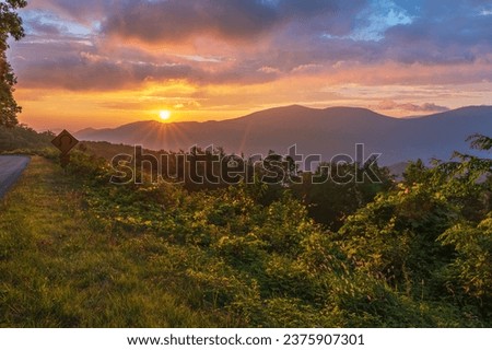Sun rising in the mountains