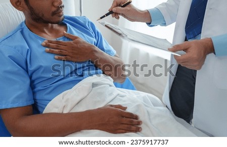 Male doctor asking about medical history and medical report Ask about pain Chest area heart muscle of male patients for diagnosis and planning Providing disease control drugs medical service concept