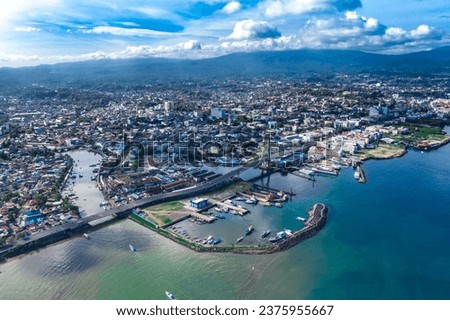 Aerial photography of Manado’s harbor Royalty-Free Stock Photo #2375955667