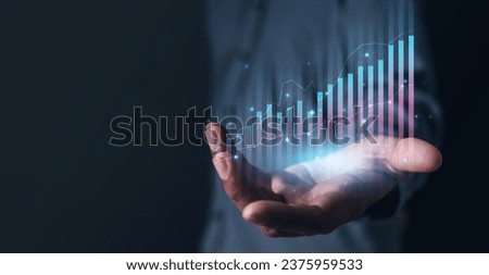 stock, bar, chart, diagram, finance, graph, growth, market, economy, financial. close up to hand, hold the bar chart of investment and their diagram is direct variation. then gentle growth up. Royalty-Free Stock Photo #2375959533
