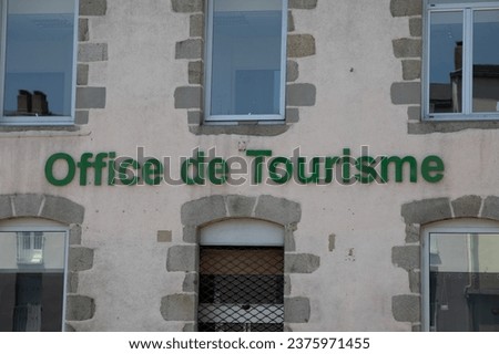 office de tourisme france text and sign on facade office entrance wall building of tour agency information tourism french center