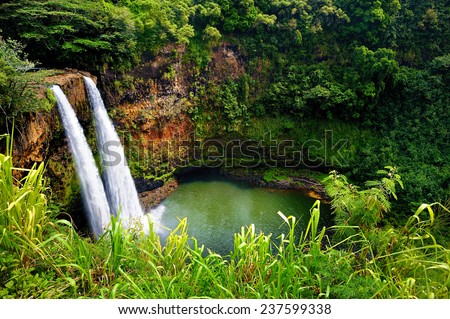 Majestic twin Wailua waterfalls on Kauai, Hawaii Royalty-Free Stock Photo #237599338