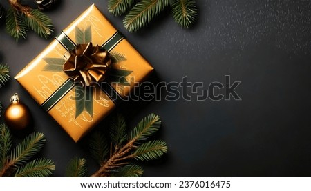Customizable creative content set against a black backdrop, showcasing a gift wrapped in an elegant manner and accompanied by vibrant fir branches Royalty-Free Stock Photo #2376016475