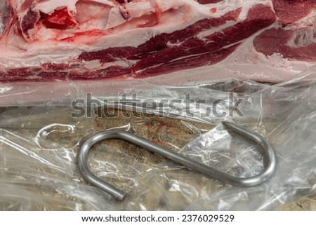 Isolated close up high resolution image of beef meat cutting and preparation process in a boutique butcher shop- USA