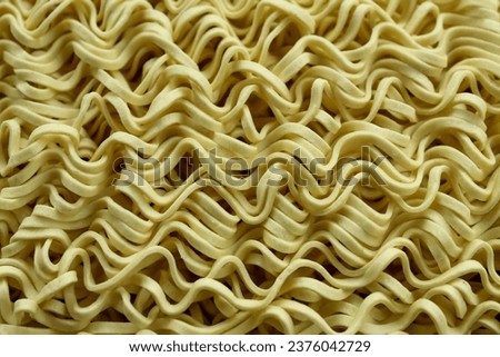 dry yellow noodle texture close up.  texture, pattern, background