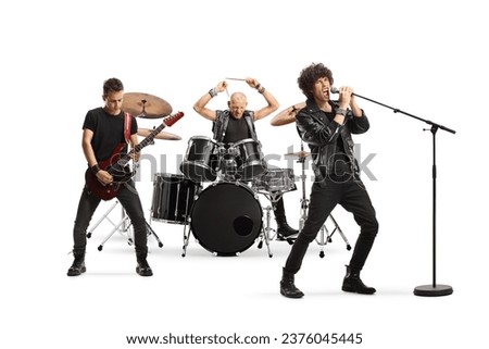 Male music band performing with a guitarist, drummer and a singer isolated on white background Royalty-Free Stock Photo #2376045445