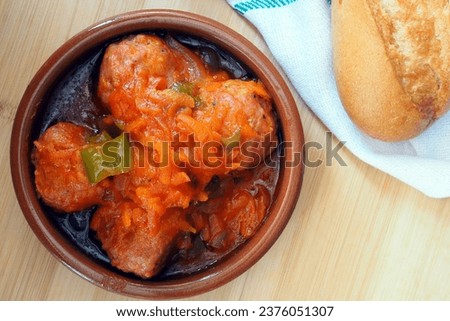 Ceramic Frying Pan with Meatballs in Tomato and Vegetable Sauce