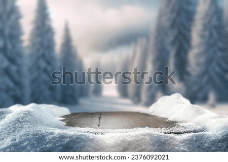 wooden desk cover of snow and frost with landscape of winter Alps. Christmas magic time. 