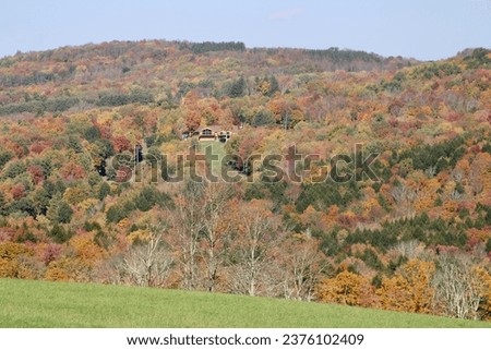 The beautiful Catskill Mountains with peak fall foliage.