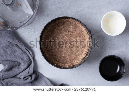 Orange Keto Cheesecake with Hazelnut Crust - an entire recipe with ingredients and prep photos Royalty-Free Stock Photo #2376120991