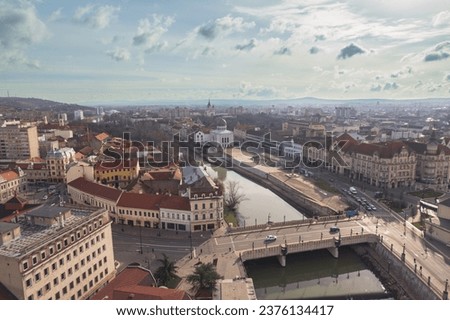 Aerial art nouveau historical a cityscape with a river flowing through the historic and art nouveau city of Oradea, captured from an aerial perspective incity Oradea, Bihor, Romania