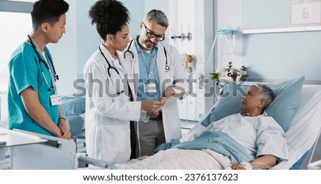 Healthcare, documents and a medical team of doctors checking on a patient in recovery or rehabilitation. Medicine, teamwork and explain with a group of health professionals in a hospital for wellness Royalty-Free Stock Photo #2376137623