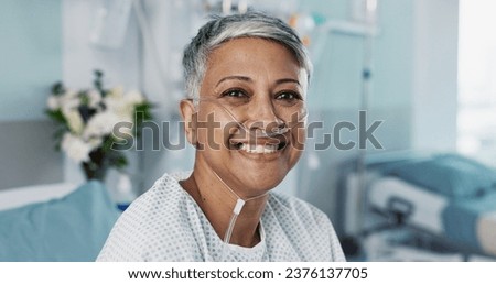 Hospital, patient and face of woman in bed with ventilation tube for oxygen, medical service and care. Healthcare, happy and portrait of mature person smile for surgery recovery, wellness and healing Royalty-Free Stock Photo #2376137705