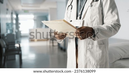 Hands, medical folder and doctor with results, person in hospital with signature, surgeon and healthcare document. Reading health report, sign off with paperwork and medicine, check info and chart