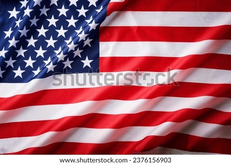 American USA flag. Beautifully waving wave American flag. National pride of United States America. Memorial, President, Labor Day background. Patriotism and commonwealth. Background for design.