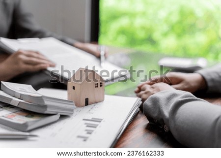 Business people signing contract making deal with real estate agent Concept for consultant home insurance
Real estate investment Property insurance security