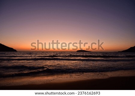 sunset long exposure waves sand greece europe. High quality photo