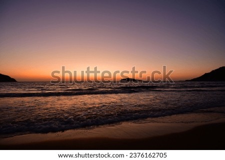 sunset long exposure waves sand greece europe. High quality photo