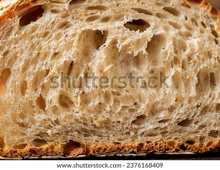 Close up of a cut slice of bread Royalty-Free Stock Photo #2376168409