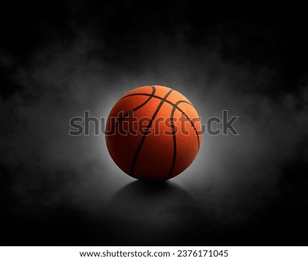 basketball with on black background with smoke