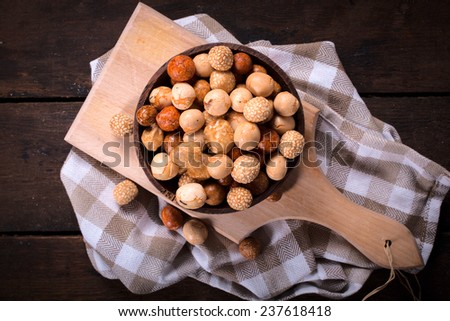 Asian snacks in the wooden bowl from above,selective focus 