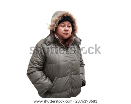 Indonesian woman wearing winter jacket, cold expression. Isolated on white background Royalty-Free Stock Photo #2376193681