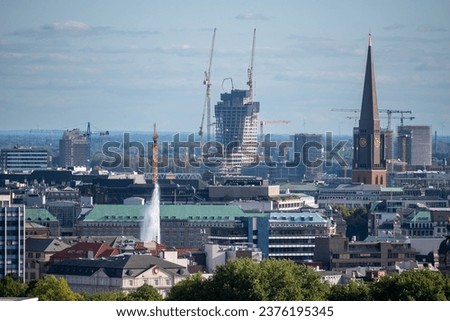Skyline of Hamburg, Germany, with the new skyscraper 'Elbtower', under construction.	