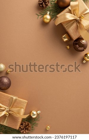 Immerse yourself in holiday spirit with air of sophistication. Vertical top view of gift boxes, brown and gold ornaments and more on lavish brown surface, leaving space for holiday wishes or promotion