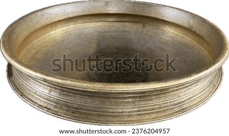 Uruli ( ഉരുളി) is a traditional cookware extensively used South Indian states of Tamil Nadu, Kerala Royalty-Free Stock Photo #2376204957