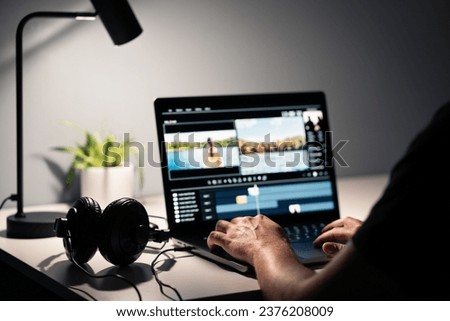 Video edit with film editor. Making movie with computer. Headphones and laptop. Sound, audio and music designer. Man working with content production software. Creative multimedia studio. Visual effect