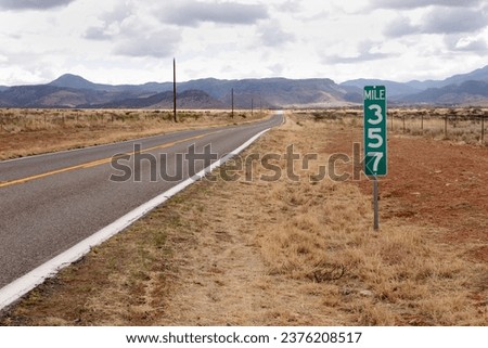 Mile 357 marker on a US highway South of Wilcox Arizona Royalty-Free Stock Photo #2376208517