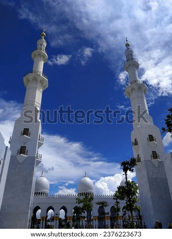 The Syekh Zayed Mosque in Surakarta is one of the iconic religious tourist attractions in Indonesia. The blue sky adds to the architectural beauty of the mosque Royalty-Free Stock Photo #2376223673