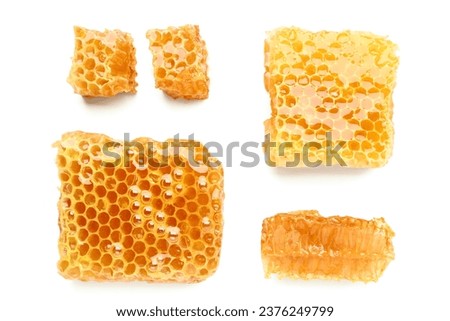 Sweet honeycombs on white background Royalty-Free Stock Photo #2376249799